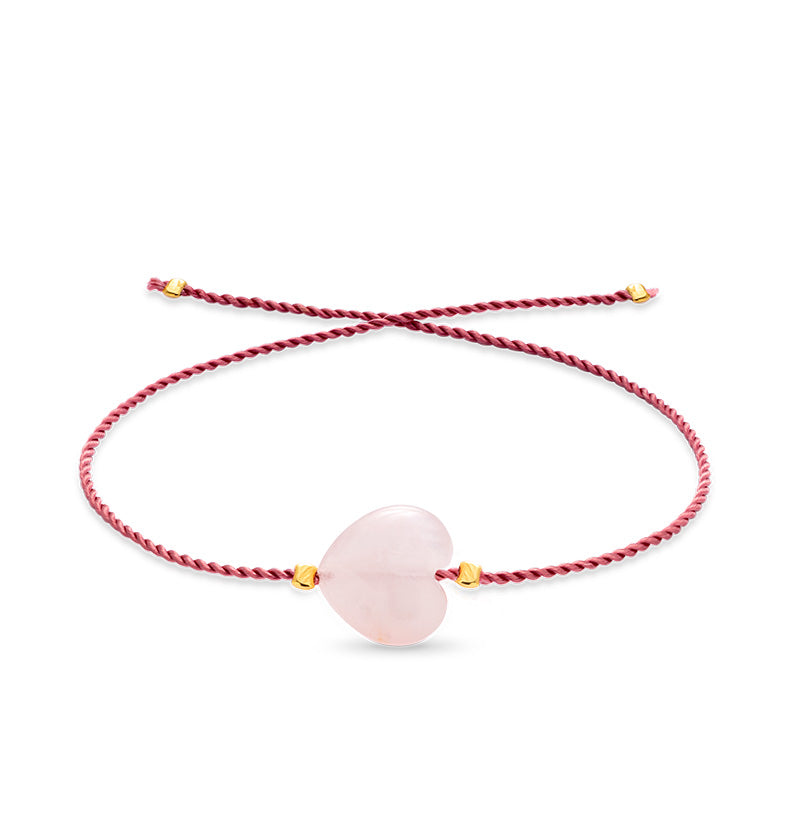  A bracelet on a pink string with a large pink heart 1 