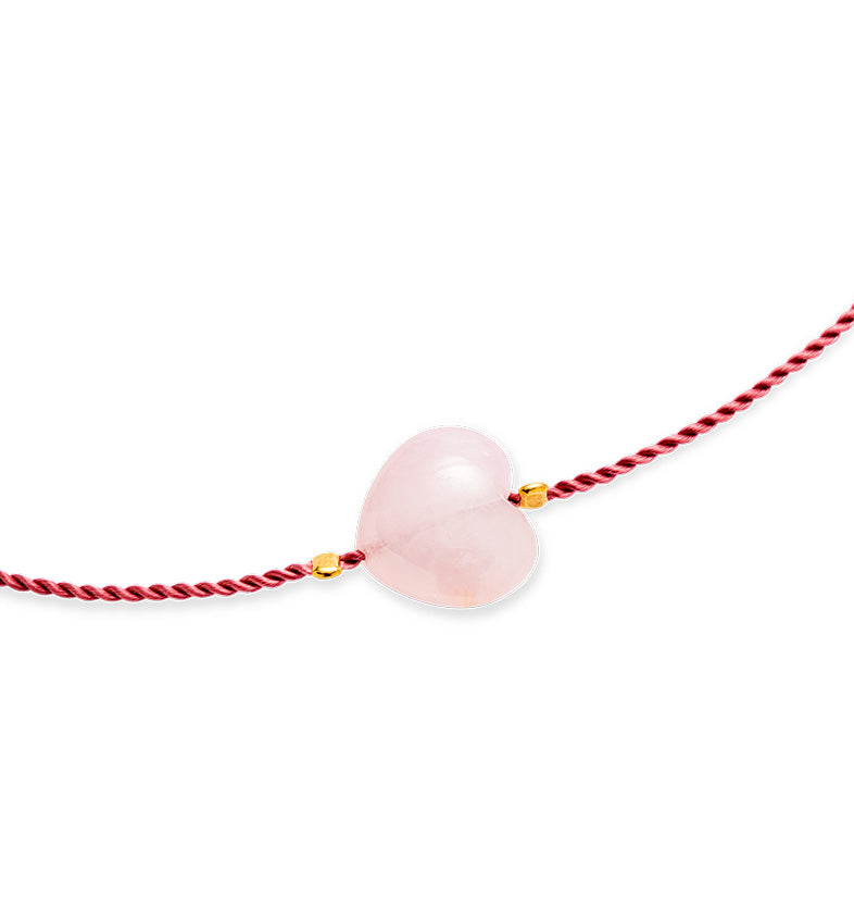  A bracelet on a pink string with a large pink heart 2 