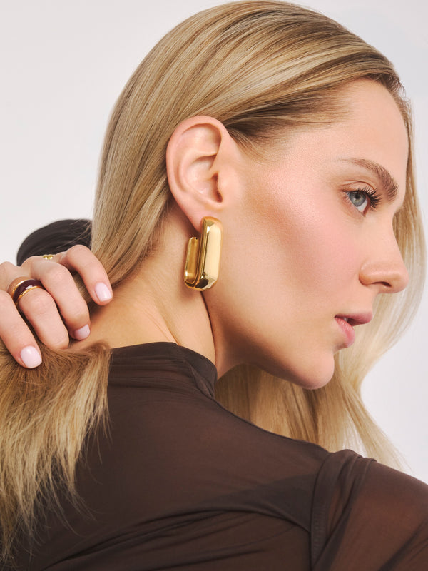 Długie geometryczne, dmuchane kolczyki pozłacane Helene