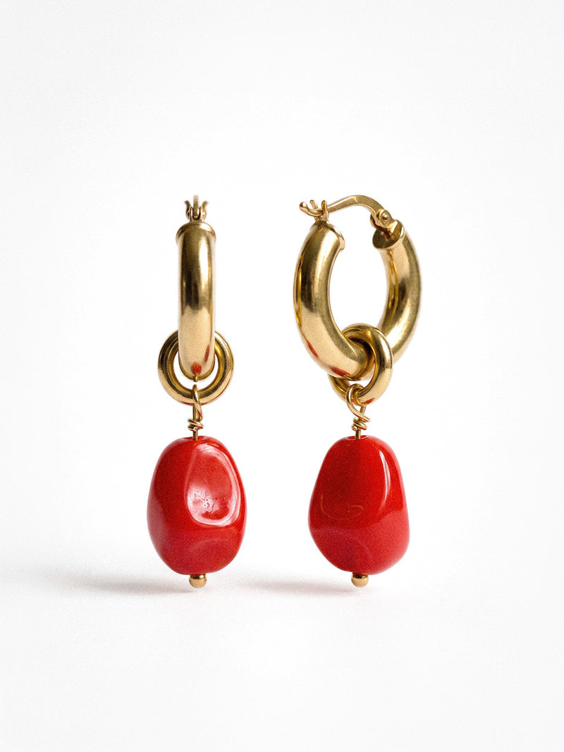 Gold-plated earrings with red pendants